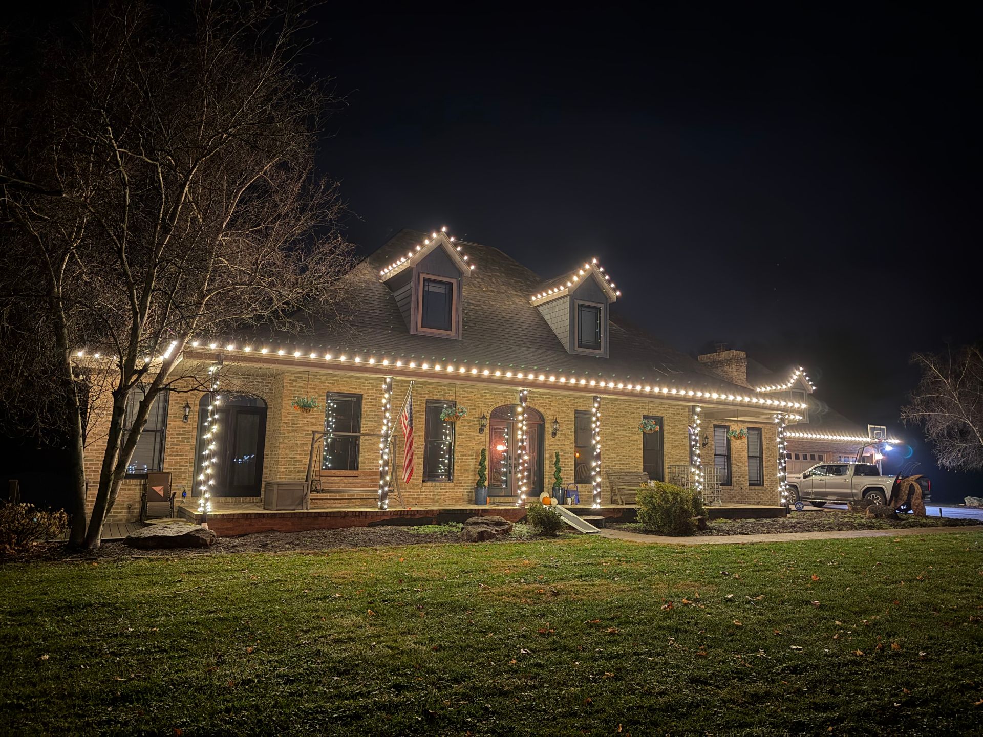 Brick home with warm column lighting