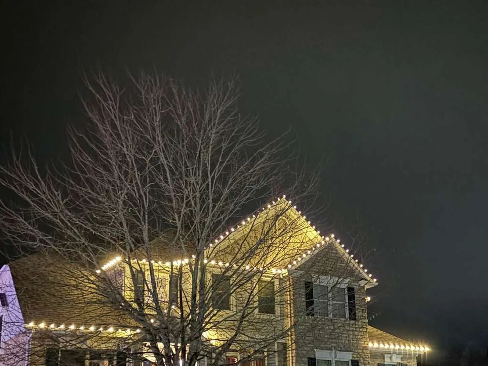 Two-story home with full roofline display